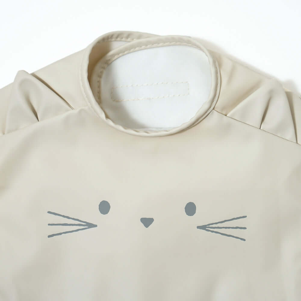 お食事ポーチロン 袖なし ねこアイボリー